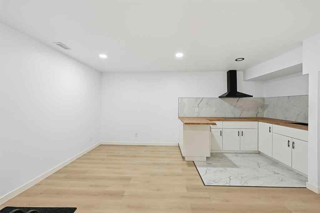 MLS® A2267001 - 217 coopers Grove SW in Coopers Crossing Airdrie, Residential