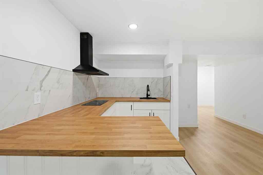 MLS® A2267001 - 217 coopers Grove SW in Coopers Crossing Airdrie, Residential