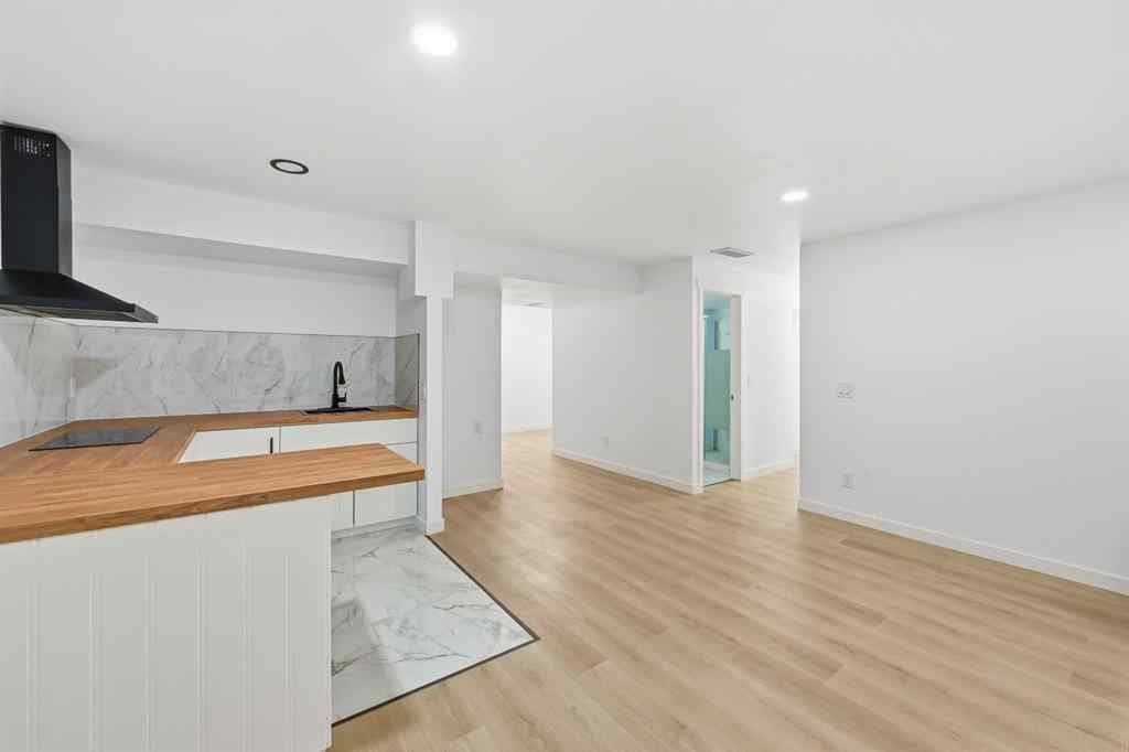 MLS® A2267001 - 217 coopers Grove SW in Coopers Crossing Airdrie, Residential