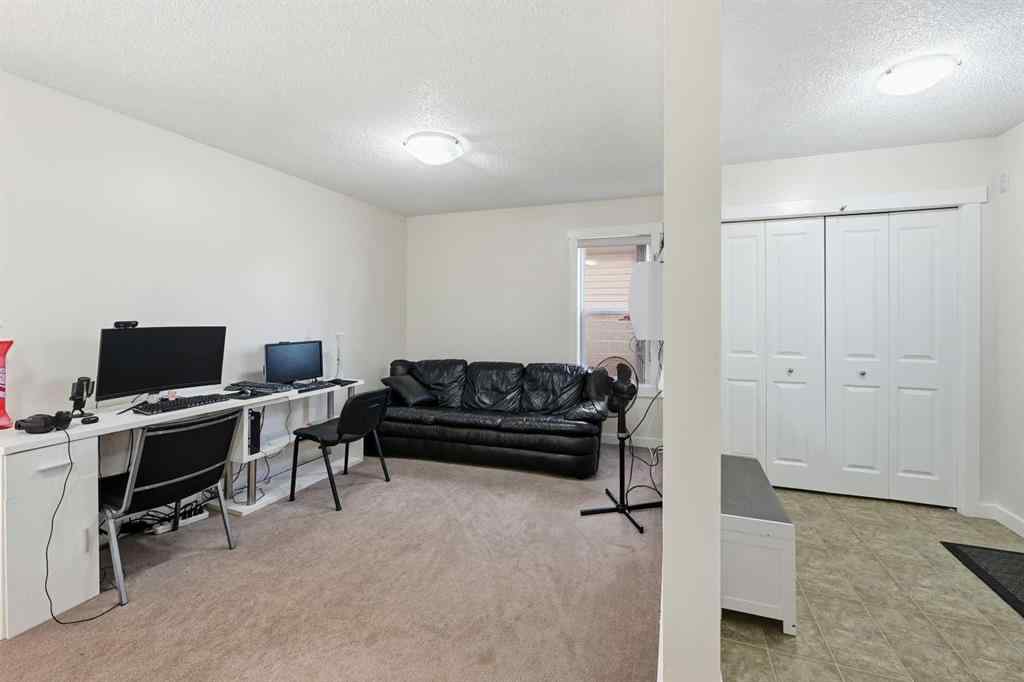 MLS® A2267001 - 217 coopers Grove SW in Coopers Crossing Airdrie, Residential