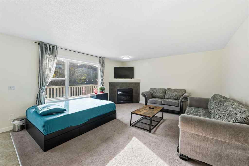 MLS® A2267001 - 217 coopers Grove SW in Coopers Crossing Airdrie, Residential