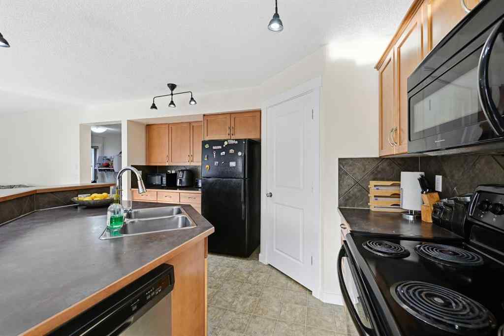 MLS® A2267001 - 217 coopers Grove SW in Coopers Crossing Airdrie, Residential