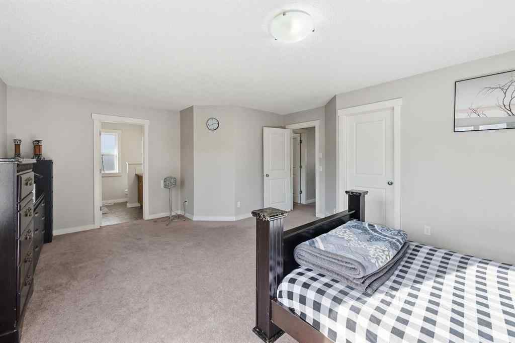 MLS® A2267001 - 217 coopers Grove SW in Coopers Crossing Airdrie, Residential