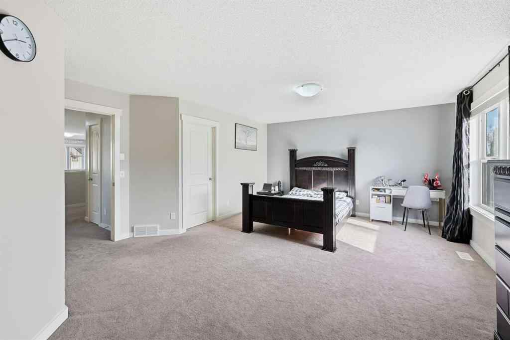 MLS® A2267001 - 217 coopers Grove SW in Coopers Crossing Airdrie, Residential