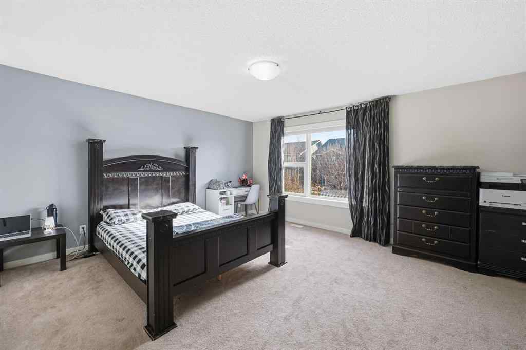 MLS® A2267001 - 217 coopers Grove SW in Coopers Crossing Airdrie, Residential