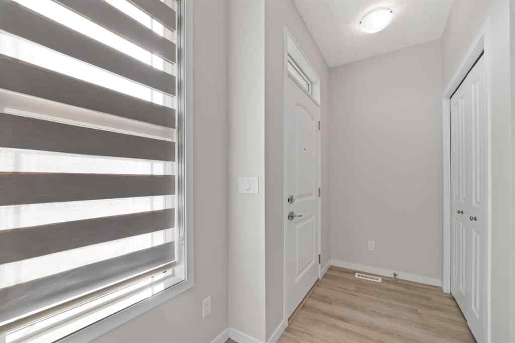 MLS® A2267008 - 281 Creekside Boulevard SW in Pine Creek Calgary, Residential