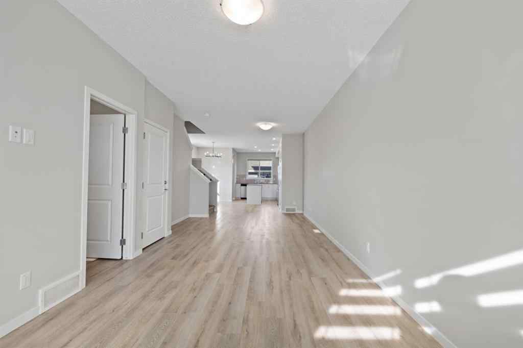 MLS® A2267008 - 281 Creekside Boulevard SW in Pine Creek Calgary, Residential