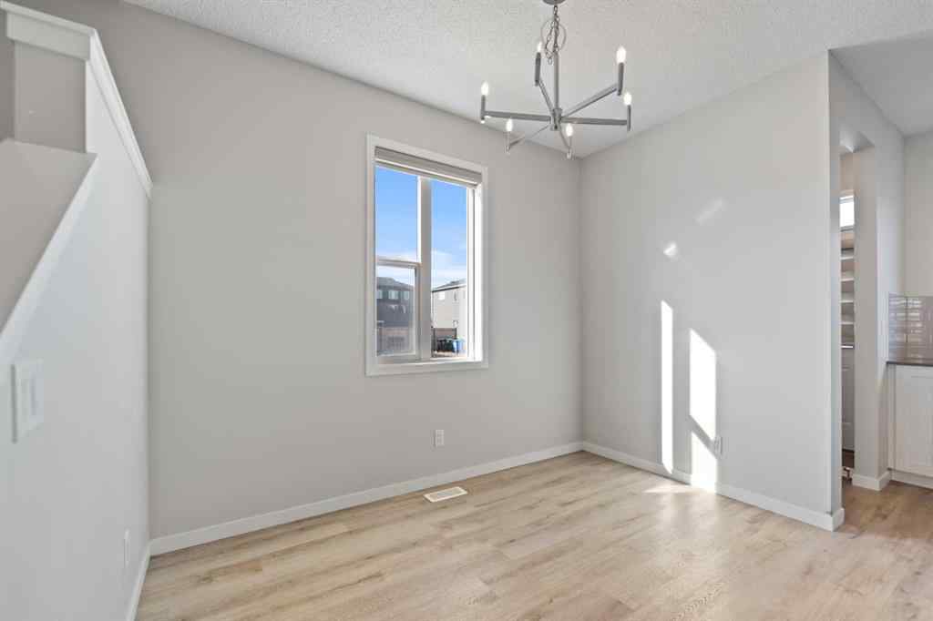 MLS® A2267008 - 281 Creekside Boulevard SW in Pine Creek Calgary, Residential