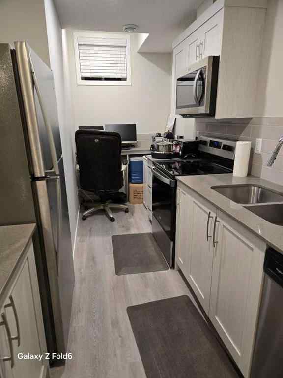 MLS® A2267008 - 281 Creekside Boulevard SW in Pine Creek Calgary, Residential