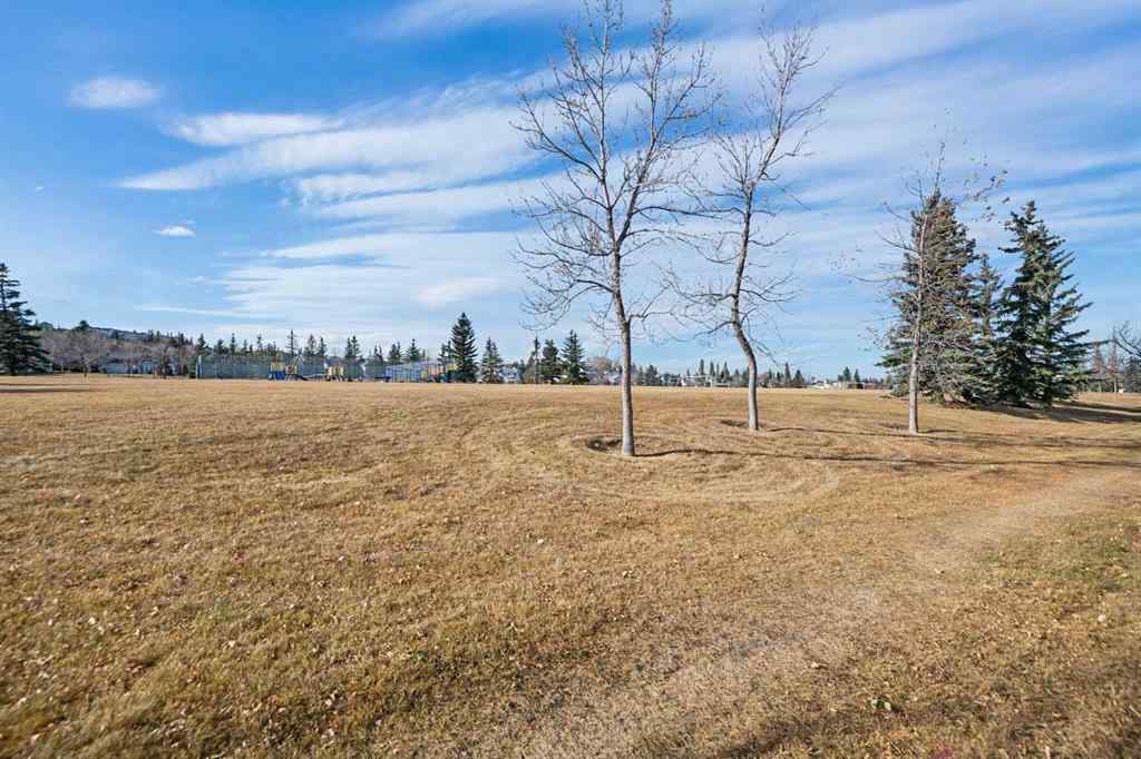 MLS® A2267009 - 95 Macewan Meadow Way NW in MacEwan Glen Calgary, Residential