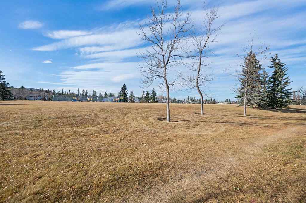 MLS® A2267009 - 95 Macewan Meadow Way NW in MacEwan Glen Calgary, Residential