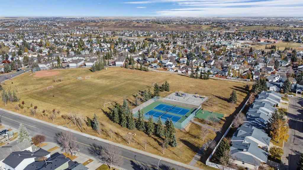 MLS® A2267009 - 95 Macewan Meadow Way NW in MacEwan Glen Calgary, Residential