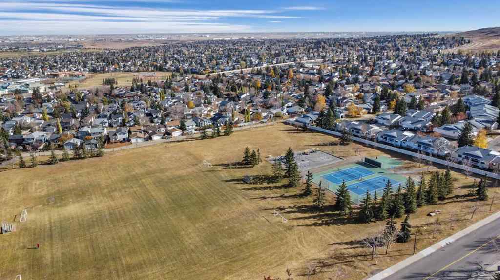 MLS® A2267009 - 95 Macewan Meadow Way NW in MacEwan Glen Calgary, Residential