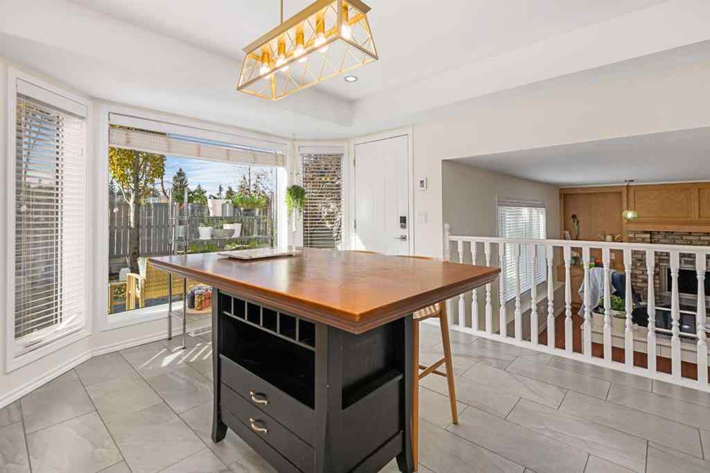 MLS® A2267009 - 95 Macewan Meadow Way NW in MacEwan Glen Calgary, Residential