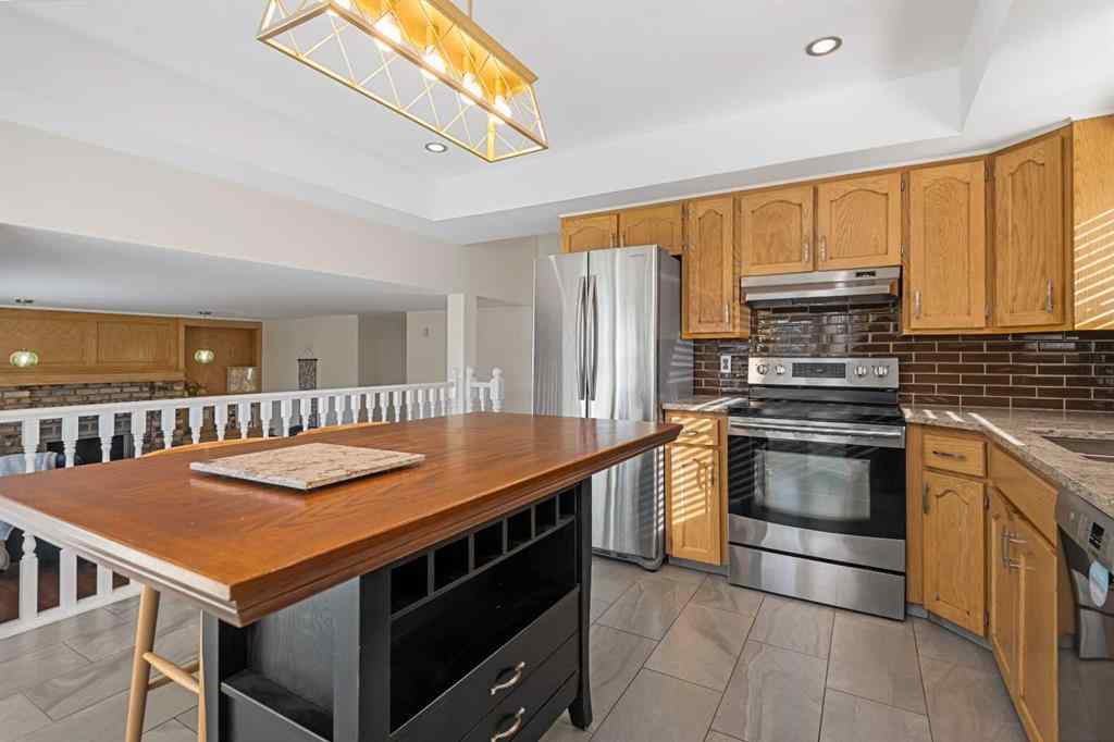 MLS® A2267009 - 95 Macewan Meadow Way NW in MacEwan Glen Calgary, Residential