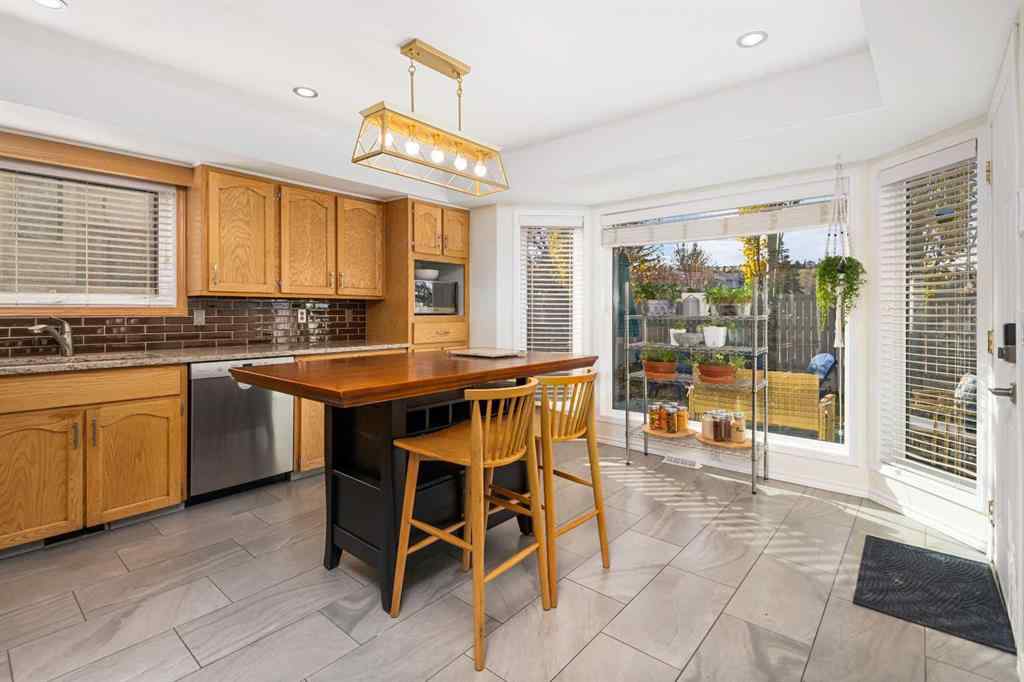 MLS® A2267009 - 95 Macewan Meadow Way NW in MacEwan Glen Calgary, Residential