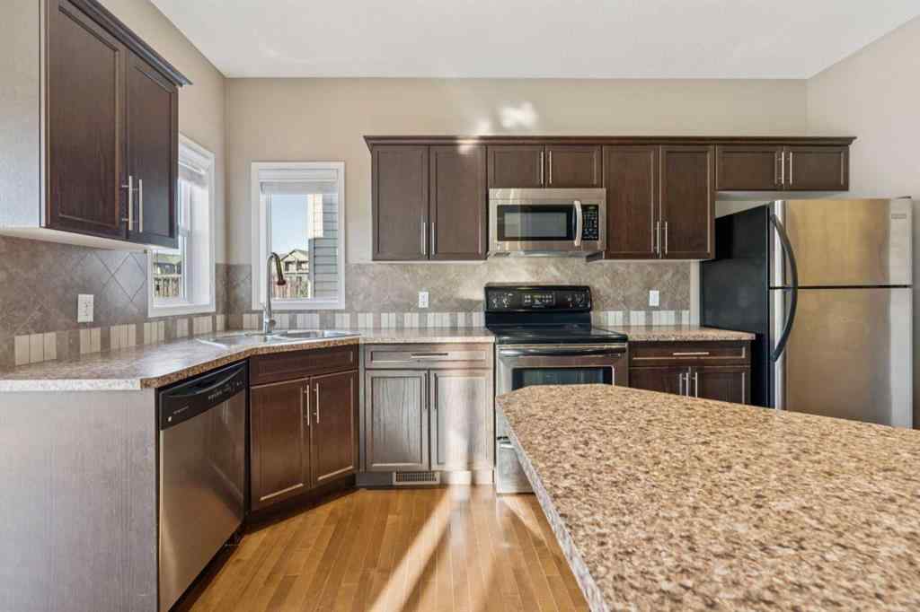 MLS® A2267012 - 34 Kingsland Close  in Kings Heights Airdrie, Residential