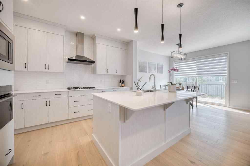 MLS® A2267013 - 156 Ambleside Crescent NW in Moraine Calgary, Residential