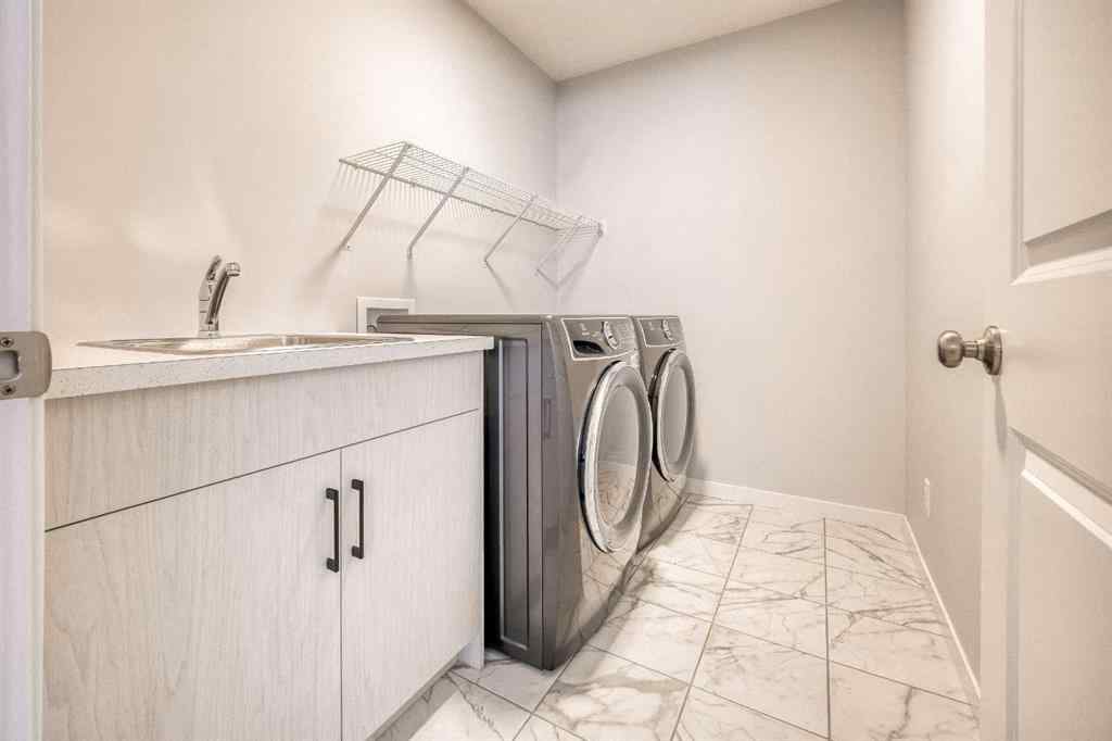 MLS® A2267013 - 156 Ambleside Crescent NW in Moraine Calgary, Residential