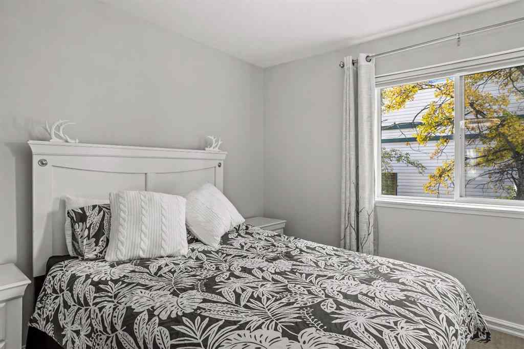 MLS® A2267039 - Unit #32 200 Glacier Drive  in Cougar Creek Canmore, Residential