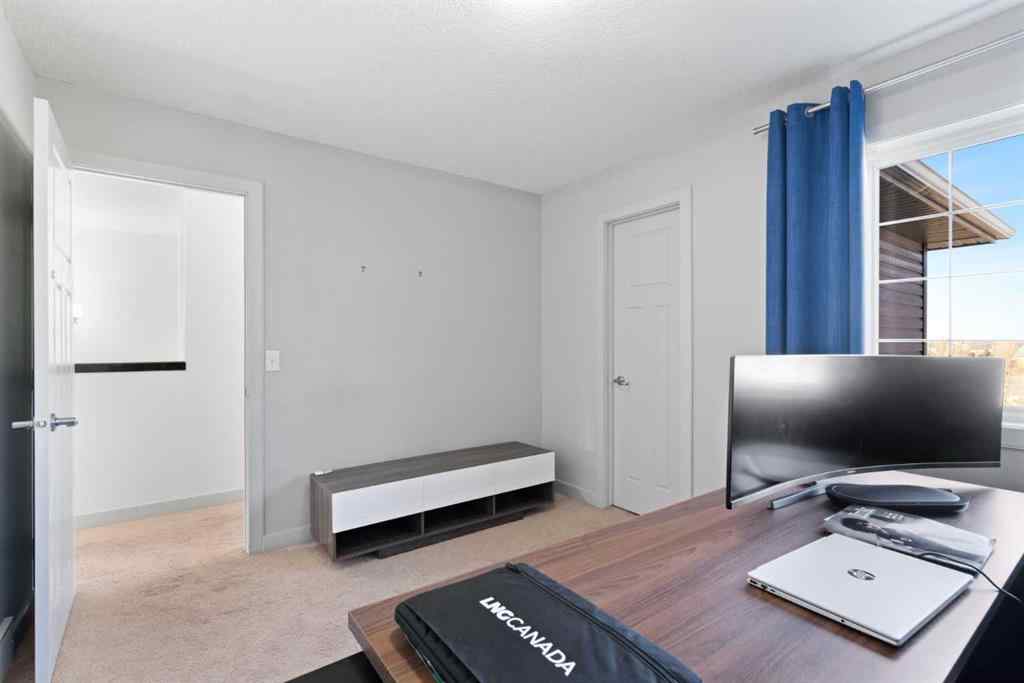 MLS® A2267046 - 105 Everhollow Rise SW in Evergreen Calgary, Residential