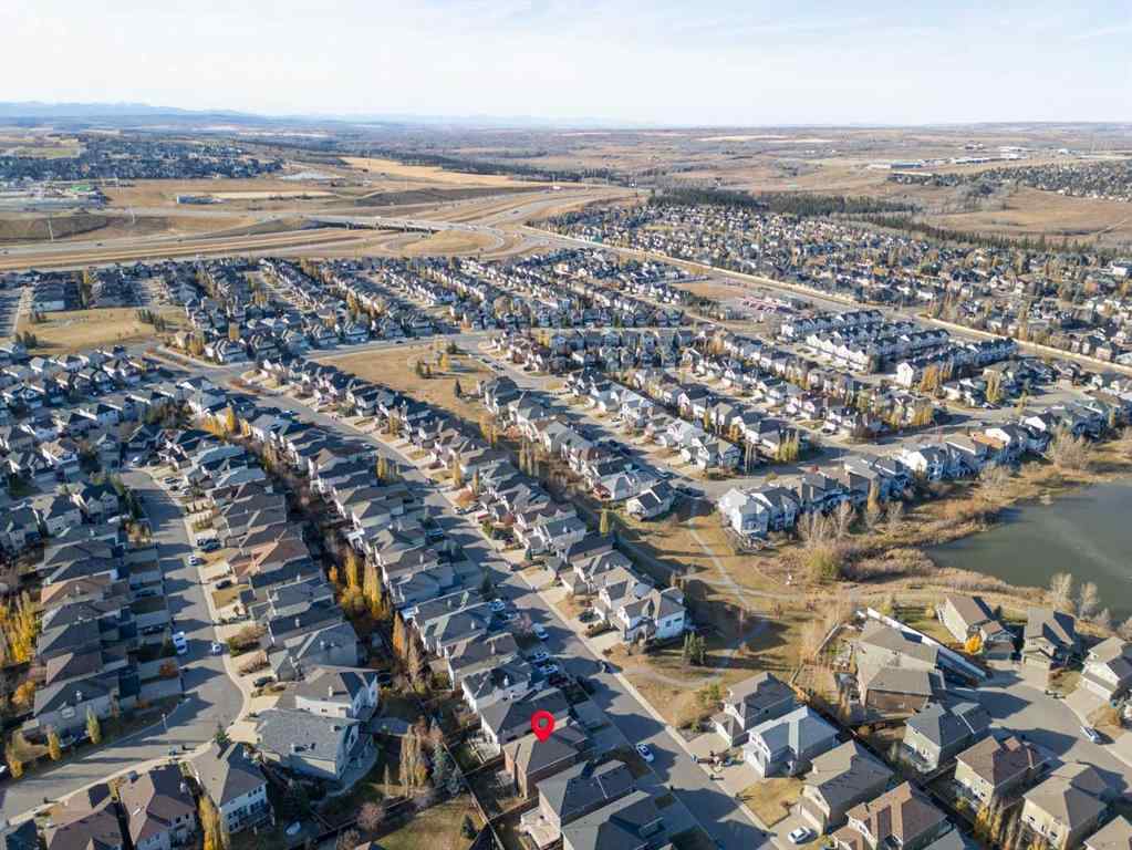 MLS® A2267046 - 105 Everhollow Rise SW in Evergreen Calgary, Residential