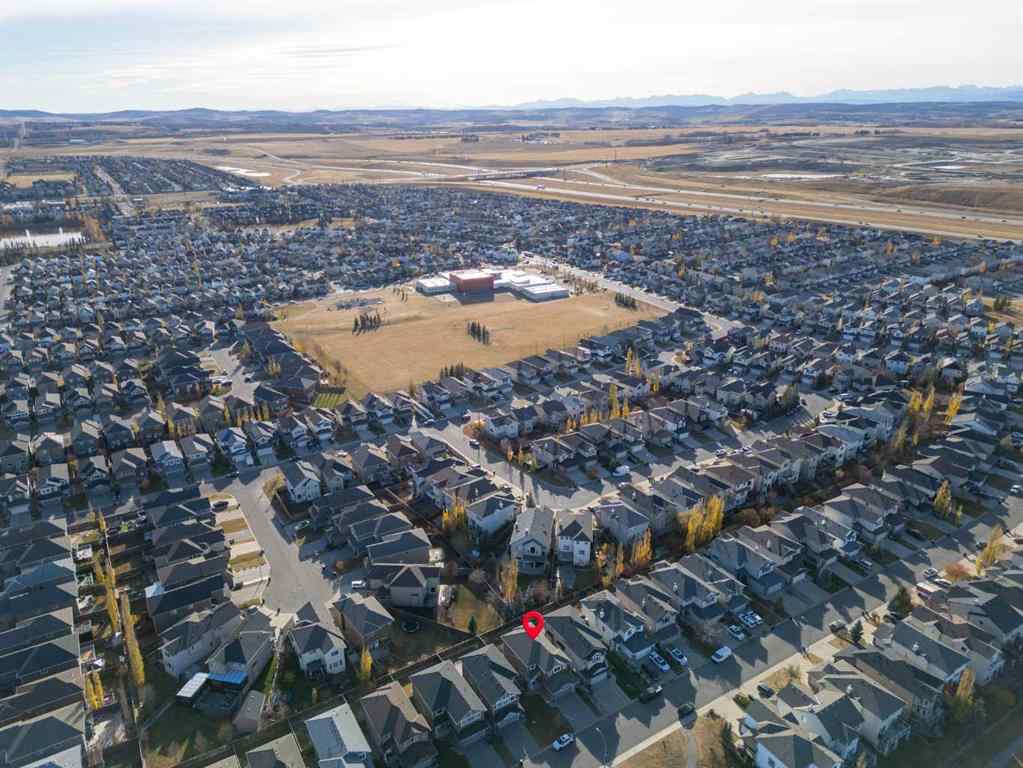 MLS® A2267046 - 105 Everhollow Rise SW in Evergreen Calgary, Residential