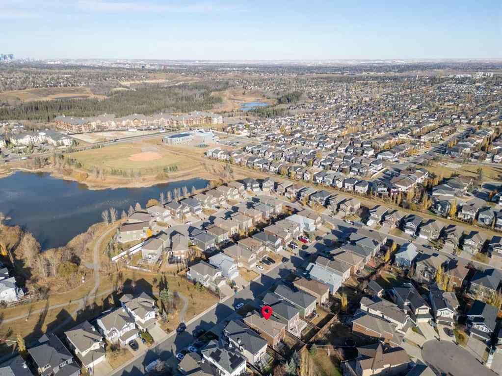 MLS® A2267046 - 105 Everhollow Rise SW in Evergreen Calgary, Residential