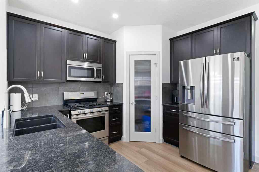 MLS® A2267046 - 105 Everhollow Rise SW in Evergreen Calgary, Residential