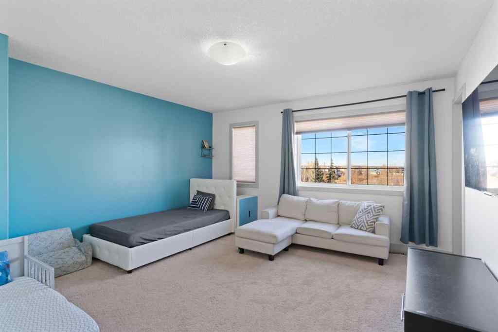 MLS® A2267046 - 105 Everhollow Rise SW in Evergreen Calgary, Residential