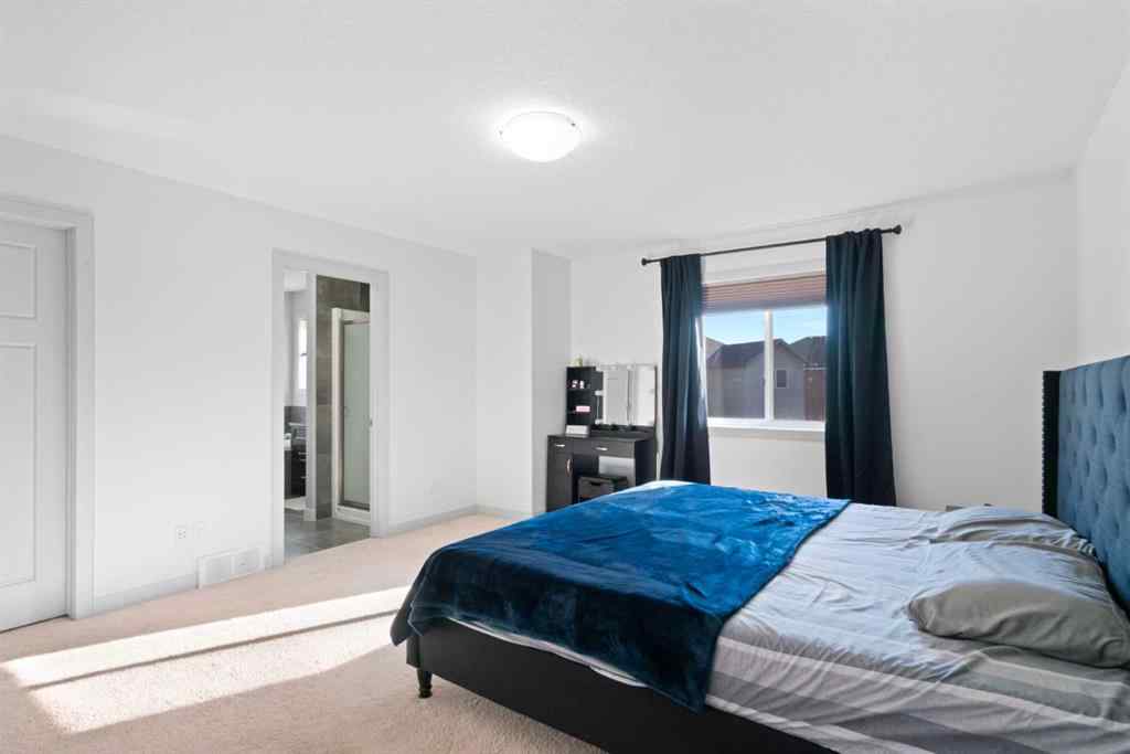 MLS® A2267046 - 105 Everhollow Rise SW in Evergreen Calgary, Residential