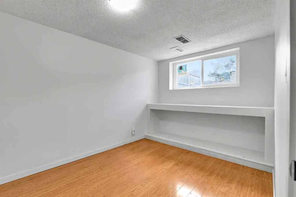 MLS® A2267053 - 10831 5 Street SW in Southwood Calgary, Residential