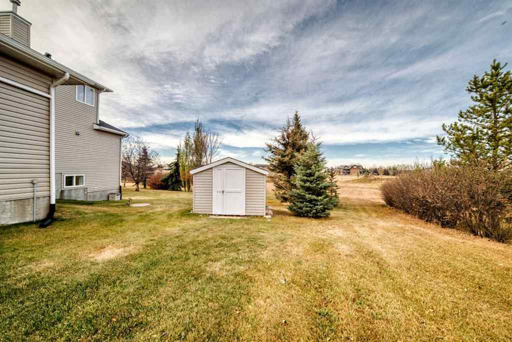 MLS® A2267077 - 7 Stage Coach Meadow  in Sharp Hill Rural Rocky View County, Residential