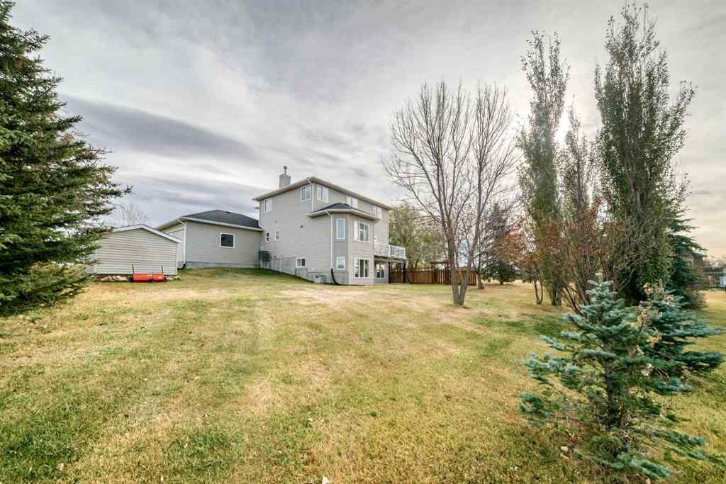 MLS® A2267077 - 7 Stage Coach Meadow  in Sharp Hill Rural Rocky View County, Residential