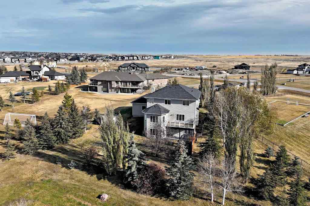 MLS® A2267077 - 7 Stage Coach Meadow  in Sharp Hill Rural Rocky View County, Residential