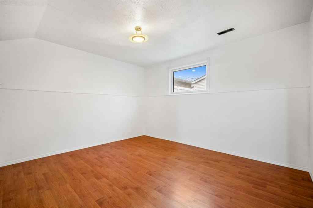 MLS® A2267079 - 62 Elsmore Place SE in Edgewater Airdrie, Residential