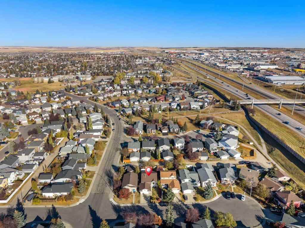 MLS® A2267079 - 62 Elsmore Place SE in Edgewater Airdrie, Residential