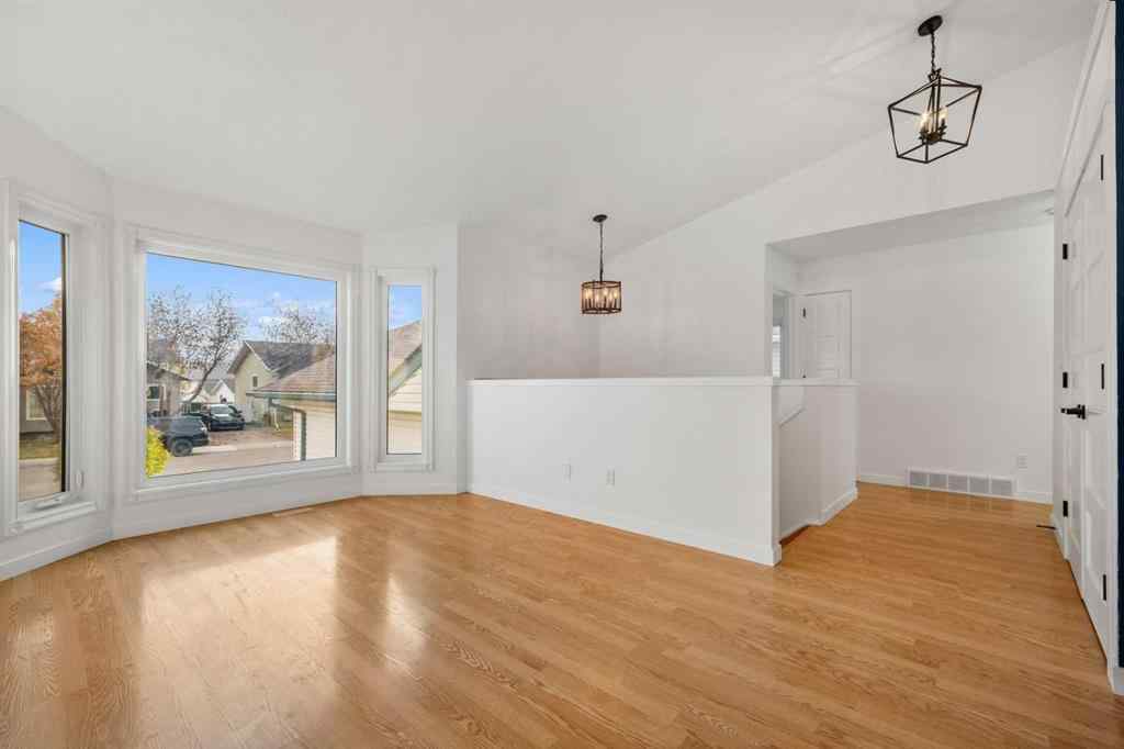 MLS® A2267079 - 62 Elsmore Place SE in Edgewater Airdrie, Residential