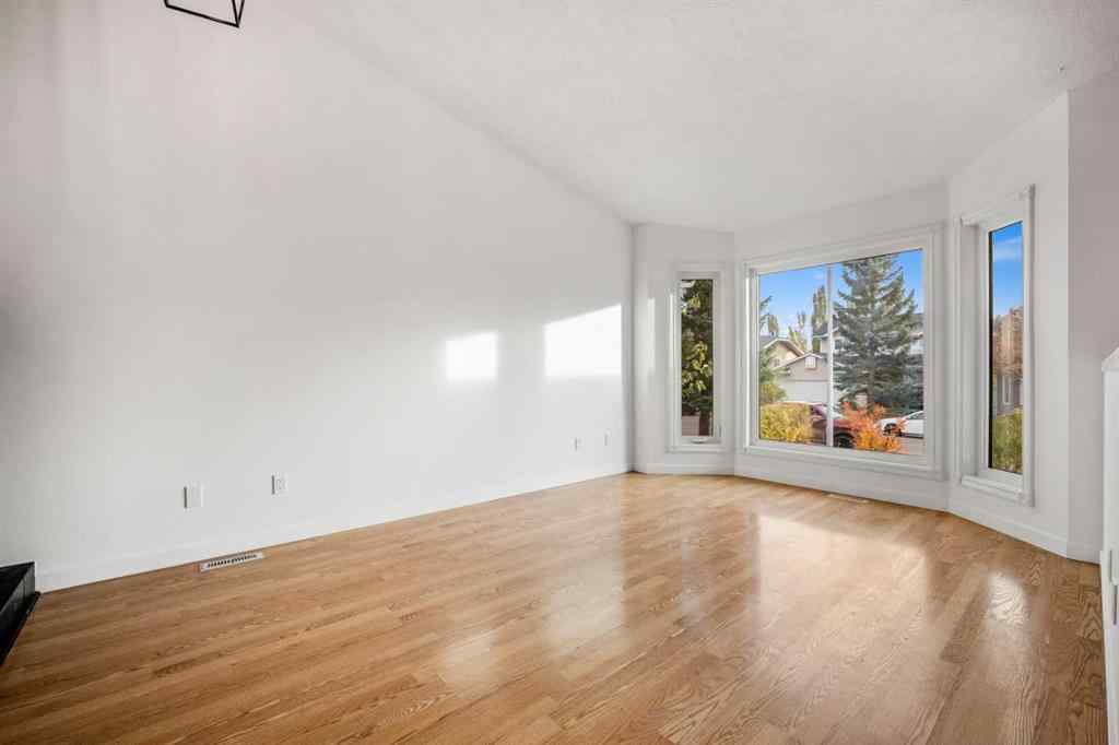 MLS® A2267079 - 62 Elsmore Place SE in Edgewater Airdrie, Residential