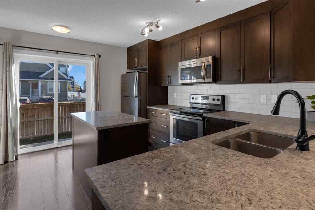 MLS® A2267083 - Unit #108 2400 Ravenswood View SE in Ravenswood Airdrie, Residential