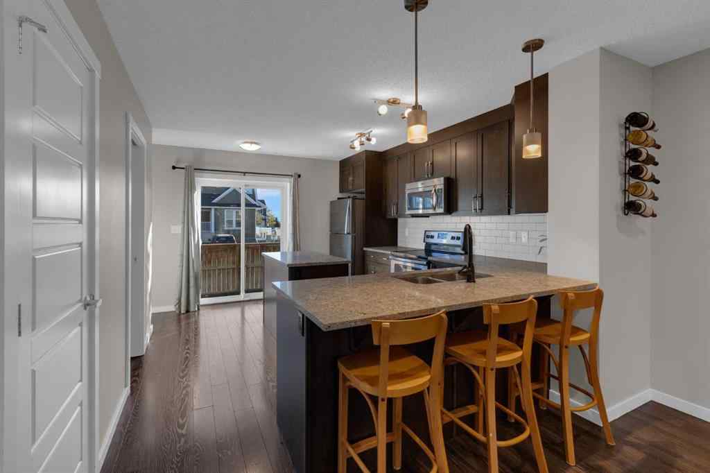 MLS® A2267083 - Unit #108 2400 Ravenswood View SE in Ravenswood Airdrie, Residential