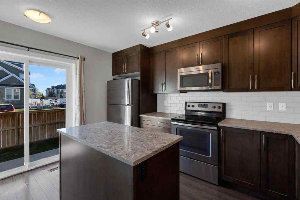MLS® A2267083 - Unit #108 2400 Ravenswood View SE in Ravenswood Airdrie, Residential