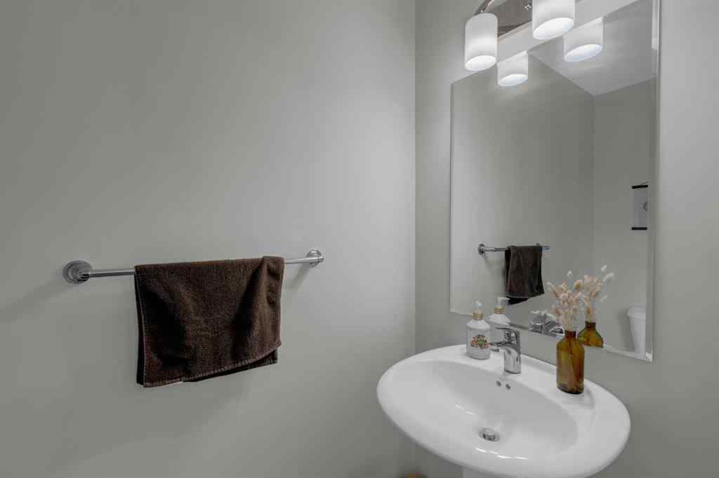 MLS® A2267083 - Unit #108 2400 Ravenswood View SE in Ravenswood Airdrie, Residential