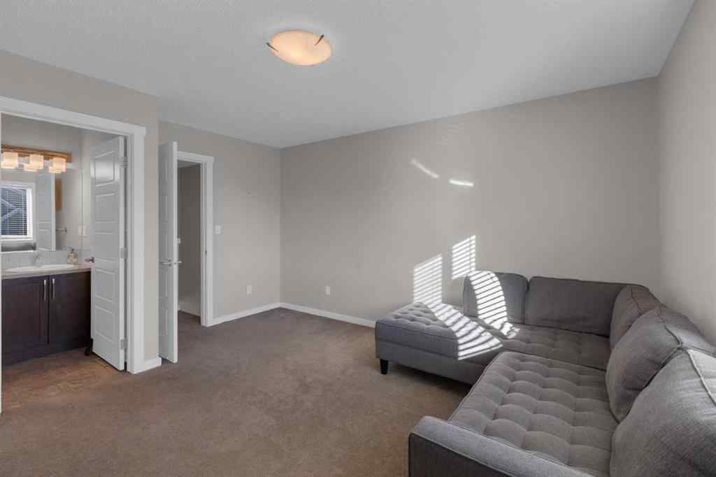 MLS® A2267083 - Unit #108 2400 Ravenswood View SE in Ravenswood Airdrie, Residential