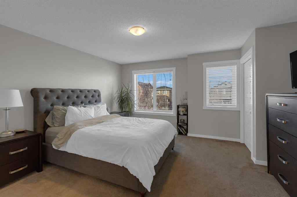 MLS® A2267083 - Unit #108 2400 Ravenswood View SE in Ravenswood Airdrie, Residential