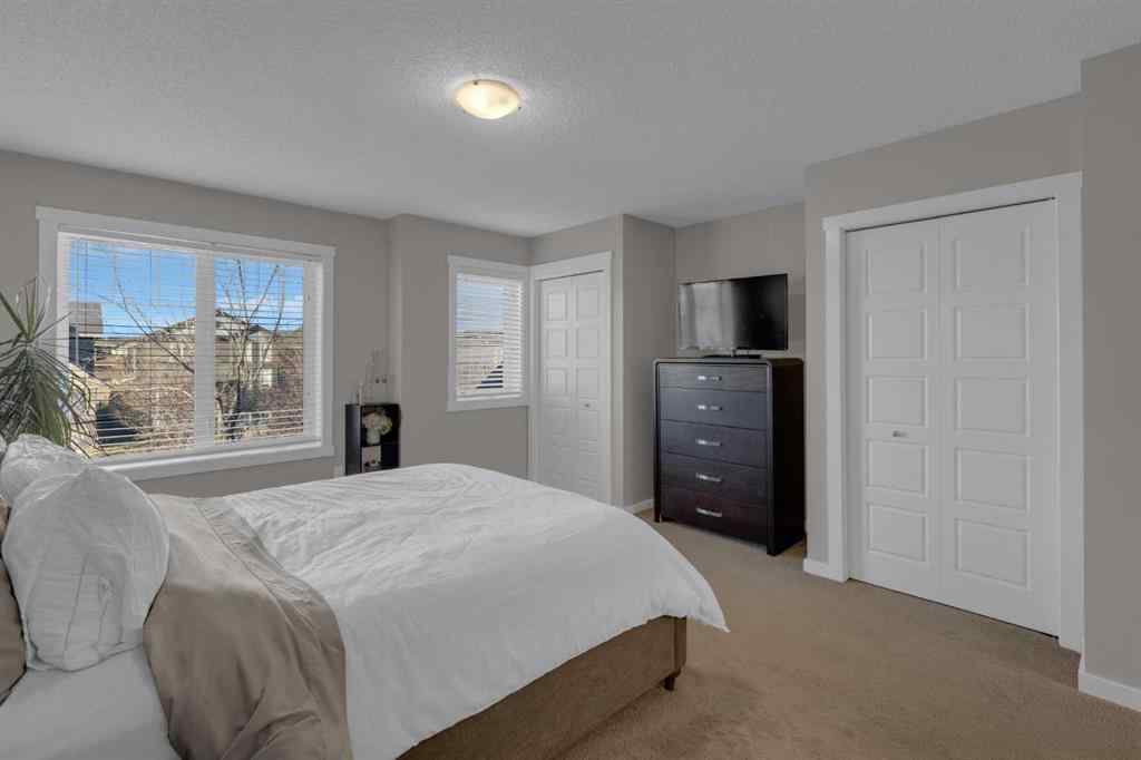 MLS® A2267083 - Unit #108 2400 Ravenswood View SE in Ravenswood Airdrie, Residential