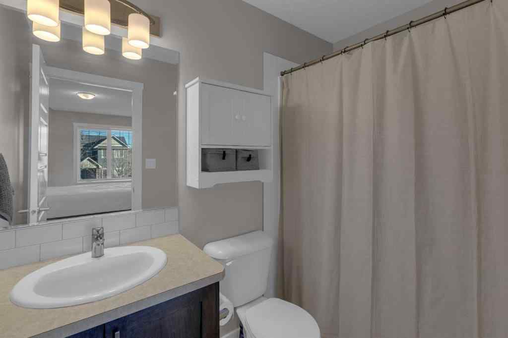 MLS® A2267083 - Unit #108 2400 Ravenswood View SE in Ravenswood Airdrie, Residential