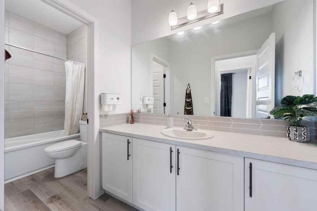 MLS® A2267101 - 633 Windrow Manor SW in Windsong Airdrie, Residential