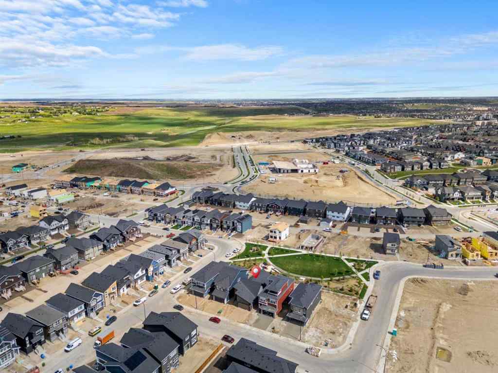 MLS® A2267140 - 218 Mitchell Heath NW in Glacier Ridge Calgary, Residential