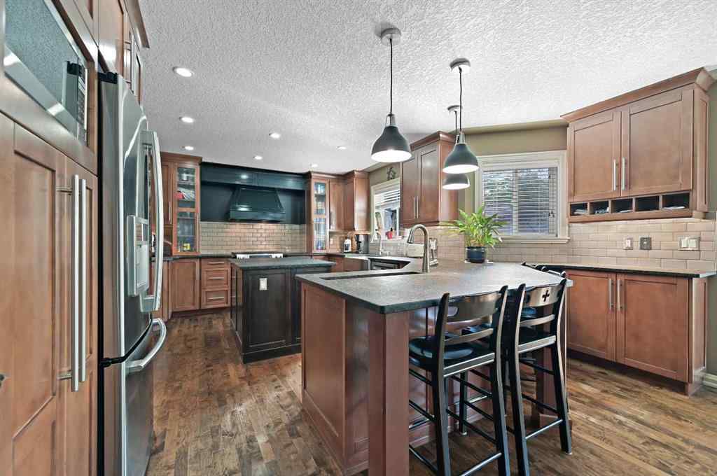 MLS® A2267148 - 41 Strathridge Crescent SW in Strathcona Park Calgary, Residential
